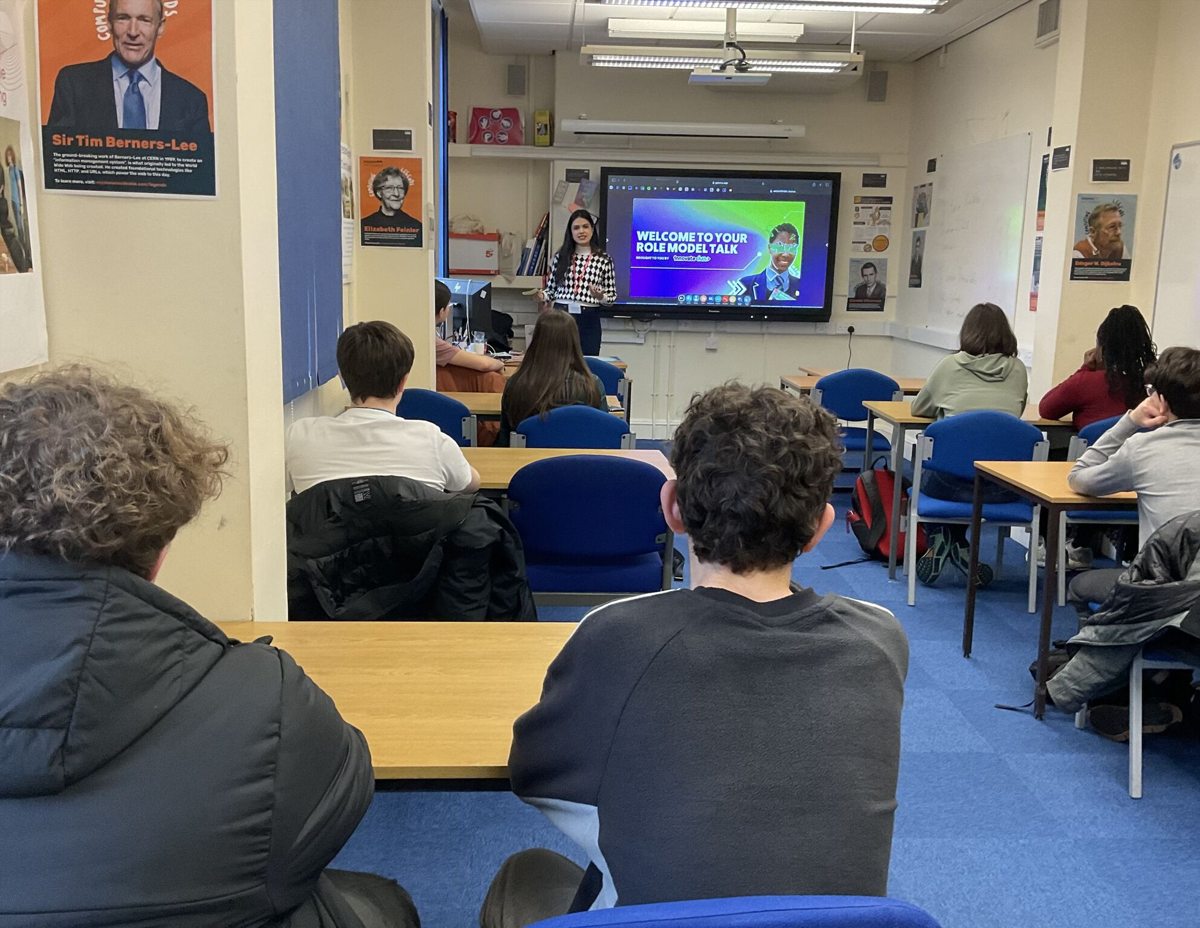 Speaking to a classroom of secondary-school students at an InnovateHer role-model talk